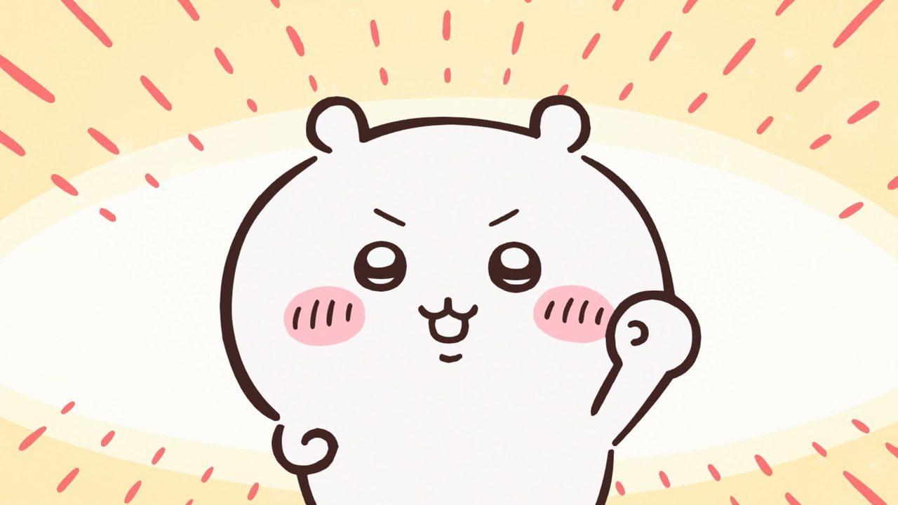 ちいかわの仲間の白いくまのキャラクターが嬉しそうに手を挙げるシーン