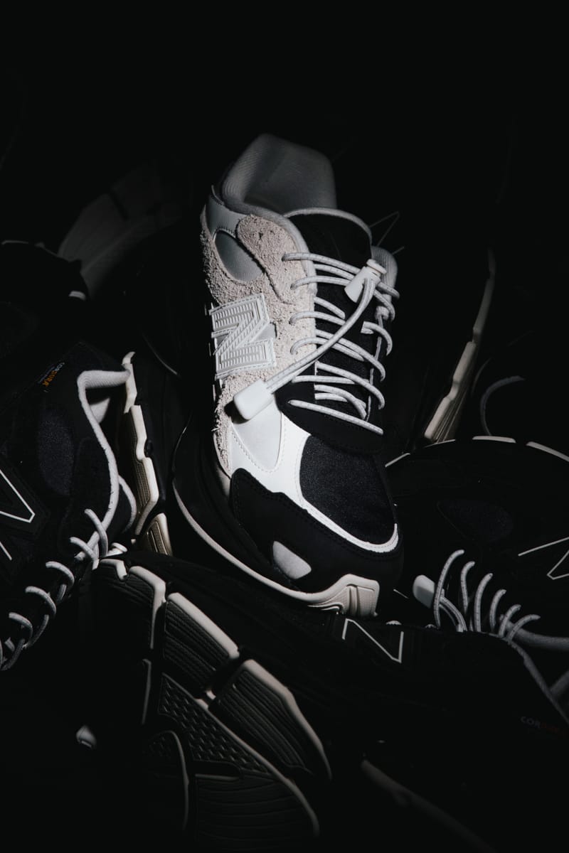 Black suede paired with white mesh panels