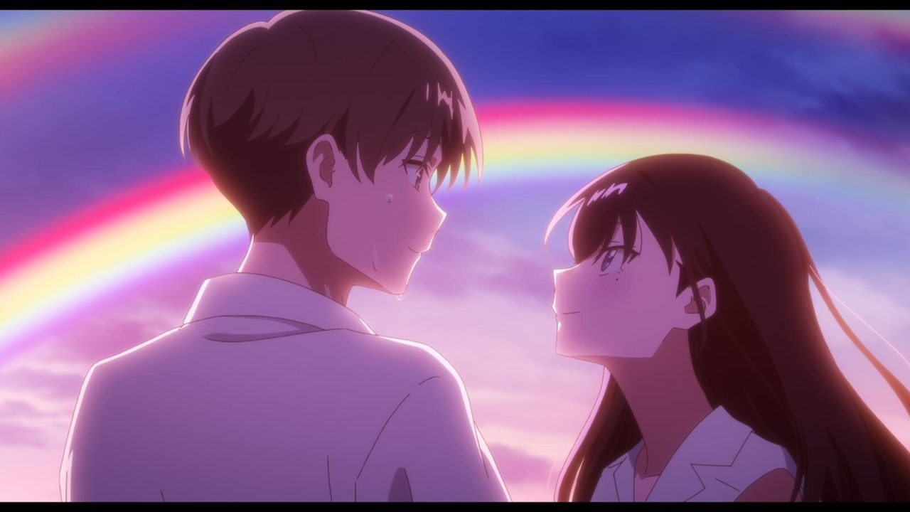 映画『どこよりも遠い場所にいる君へ』の場面カット 虹がかかる夕空の下で向かい合う二人