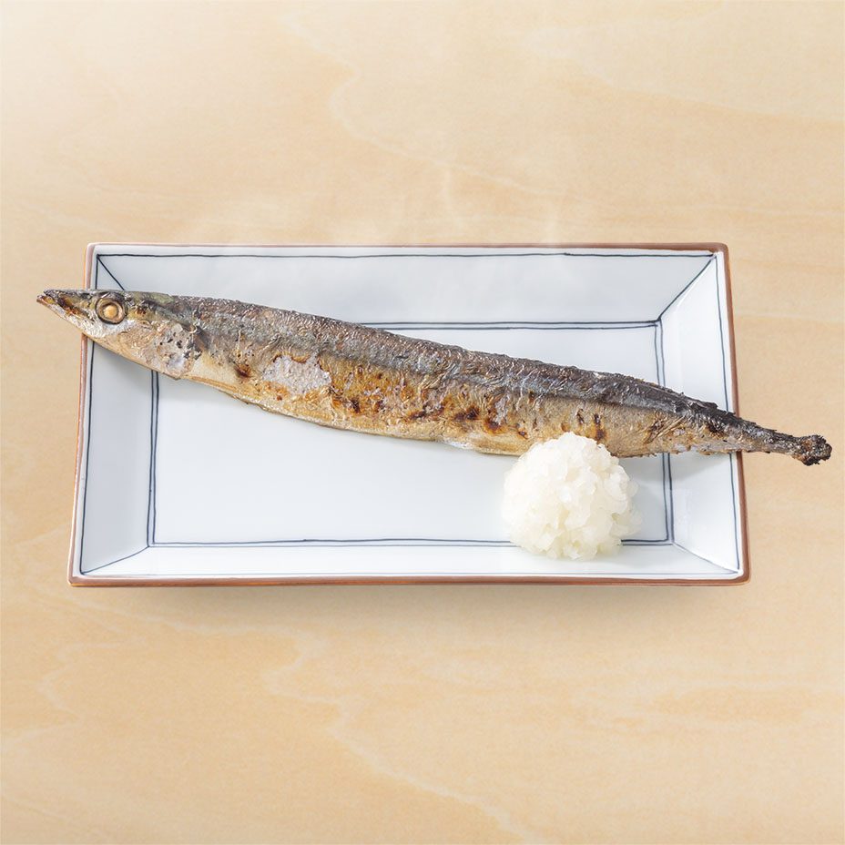 吉野家 さんま単品 木のテーブルに置かれた焼きさんま