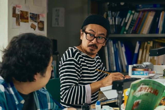 映画『見上げてごらん』マンガの制作現場の場面写真