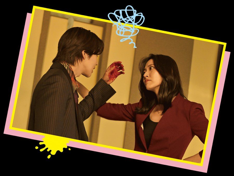 向かい合う二人が緊迫する映画昨夜は殺れたかもの場面写真