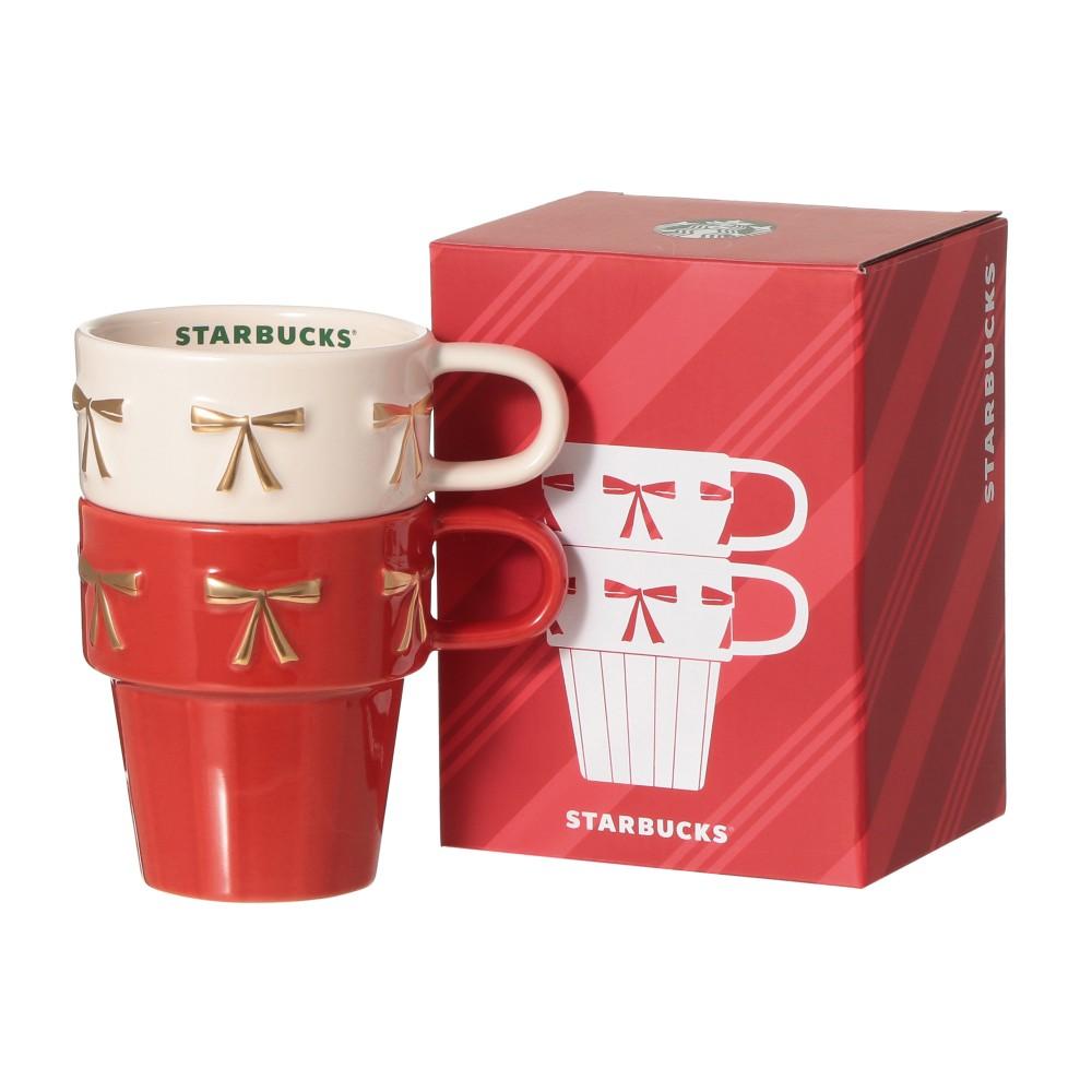 スターバックス ホリデー2026 スタッキングマグ237mlペアセット ゴールドのリボンをあしらった白と赤のマグ